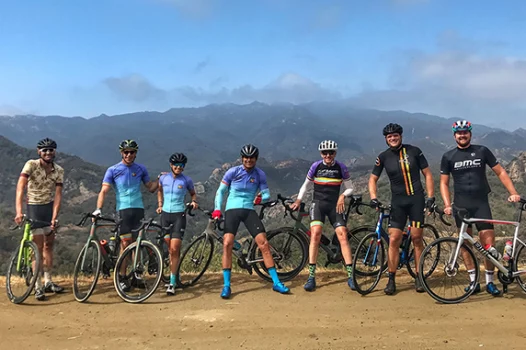 Group of cyclists at overlook in Malibu