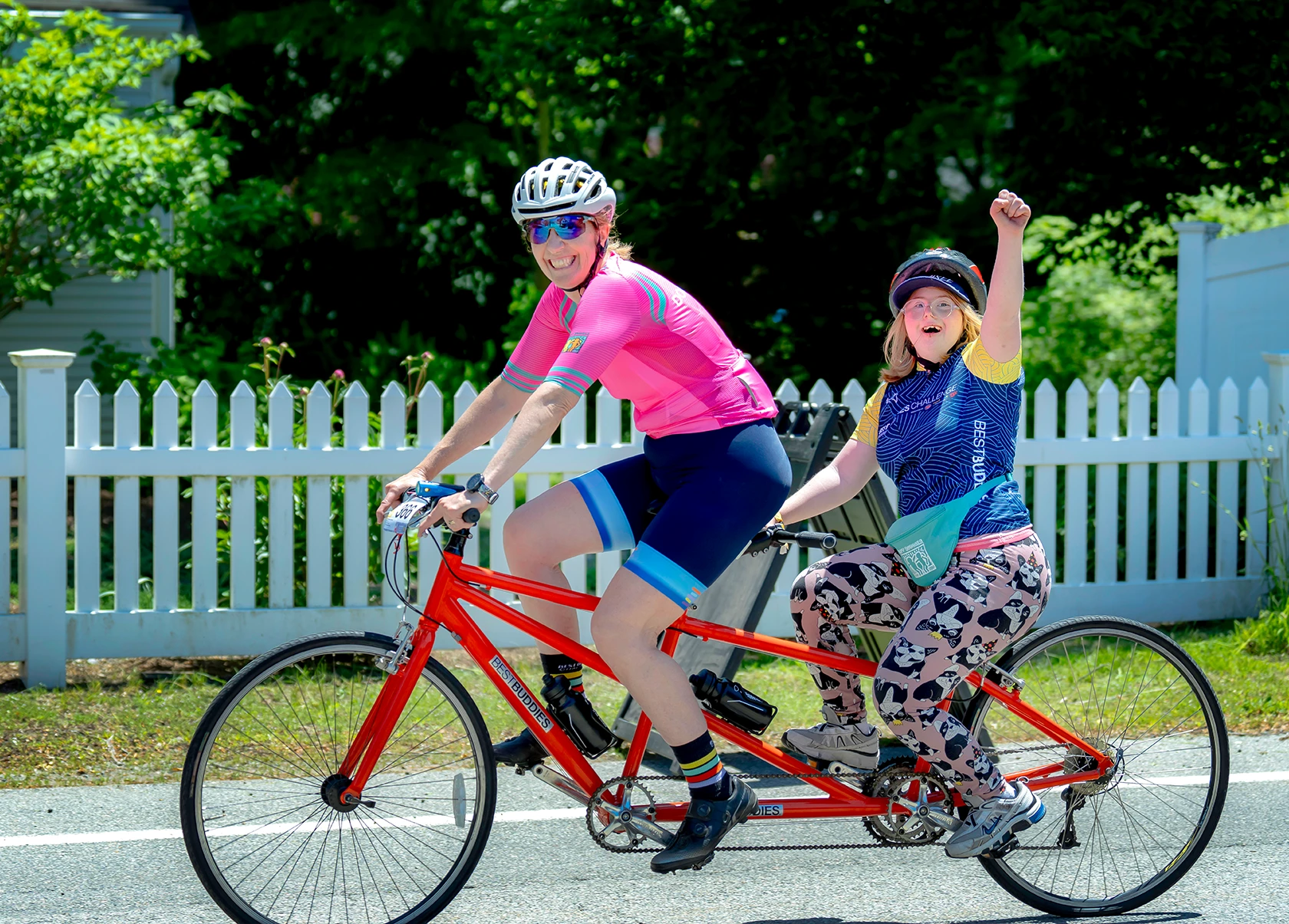 Stoker riding with a best buddies participant on a tandem bike