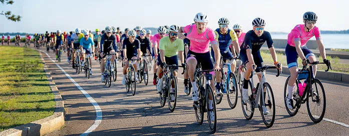 Riders cycling from the JFK Library in Boston